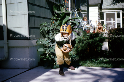Boy with Football, funny, cute, helmet, tween, 1940s