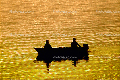 golden afternoon, Outboard motor boat, reservoir, Lake Almanor, Plumas County
