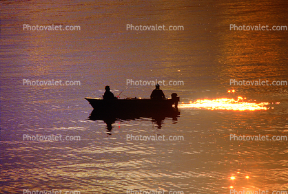 Outboard motor boat, reservoir, Lake Almanor, Plumas County