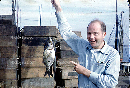 laughing, funny, fun, joking, smile, smiling, fisherman, male, fish catch, 1940s