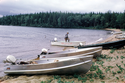 fishermen, outboard motor boats, lake, beach, forest, woods, fish catch, Nungesser, Ontario, Canada, 1970, 1970s
