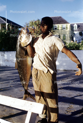 fish catch, Nassau Bahamas, man, male, 1959, 1950s