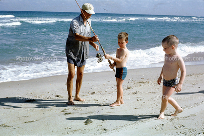 Beach, Ocean, Rod, Reel, fishermen, man, boys, fish, Outer Banks, North Carolina, 1960s