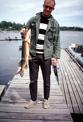 fishermen, man, fish, dock, pike, fish catch, Hudson Bay, Canada, 1969, 1960s