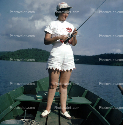 Woman, Boat, Rod and Reel, Fishing Pole, fancy pants, legs, knees, shoes, hat, fashion, 1950s