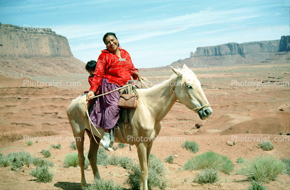 Navajo Woman with Son on a Horse, Native American, mesa