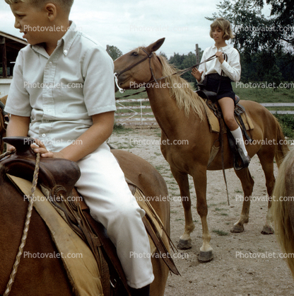 Girl and boy on a Horse, male, female