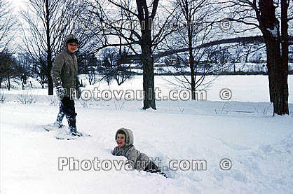 Boy Playing in Snowshoes, Cold Snow, smiles, jacket, mittens, 1960s