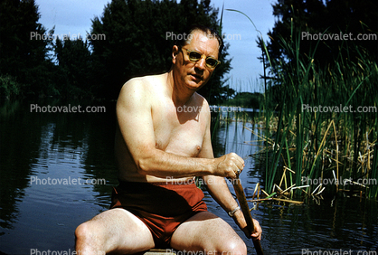 Man Rowing, male, sun exposure, sunburn, suntan, bathingsuit, sunny day, paddle, 1940s