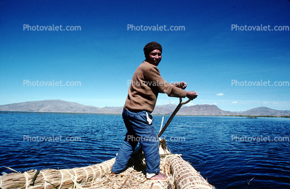 Man, smiles, water, mountains, Reed Boat, Totora Reeds, Lake Titicaca