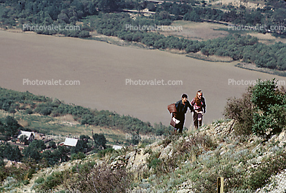 Man and Woman Hiking a Steep Mountain, Tiblisi