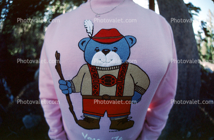 bear sweater, hiking stick, cap, hat, suspenders