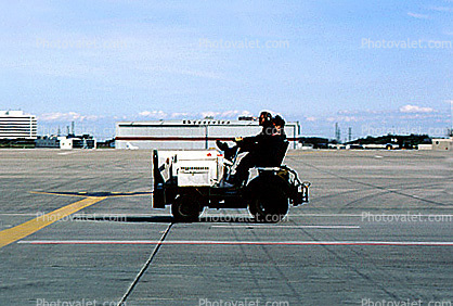 ground personal, baggage tractor