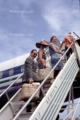 Boarding Plane, December 1964, 1960s