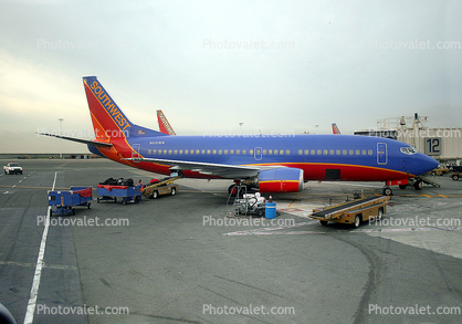 N691WN, Boeing 737-3G7, Southwest Airlines SWA, Belt Loader, Carts, 737-300 series