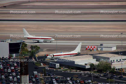 N869HH, Janet Airlines, Terminal Buildings, cars, Boeing 737-600.