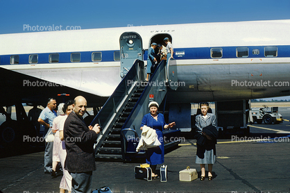 Women, men, ramp stairs, Flight 671, Douglas DC-6, September 1958, 1950s