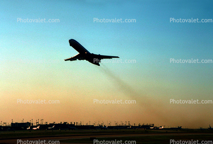 Boeing 727 taking-off into the sunset