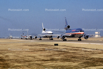 Jets lined up for take-off, American Airlines AAL, Douglas DC-10