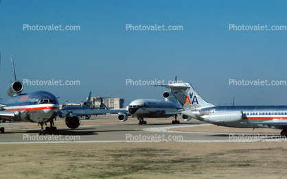 Jets lined up for take-off, American Airlines AAL, Douglas DC-10, December 2, 1986