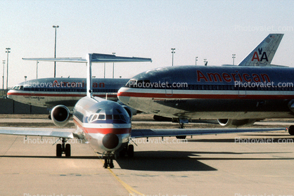 Jets lined up for take-off, American Airlines AAL, Douglas DC-10, MD-80, December 2, 1986