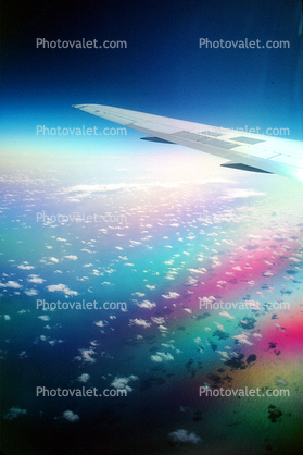 Wing in Flight, Clouds, California