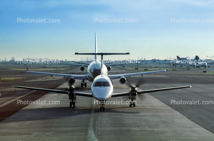Aircraft lined up for take-off, Newark Liberty International Airport, New Jersey, (EWR), USA, Embraer Brasilia EMB-120
