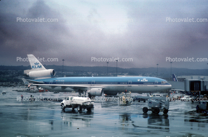 PH-KCA, MD-11 P, (SFO), KLM Airlines, rainy, inclement weather, wet, fuel truck, rain, CF6-80C2D1F, CF6
