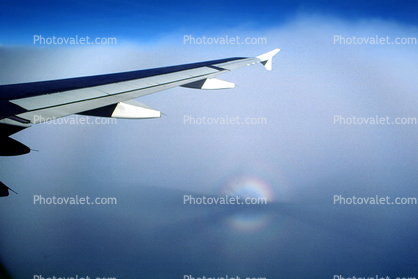 360 degree Rainbow over California, wing fence, Trailing Edge Right Wing over Southern California, Airbus A320 series, Shadow, Glory Ring Halo, Cloudbow, daytime, daylight, Lone Wing in Flight