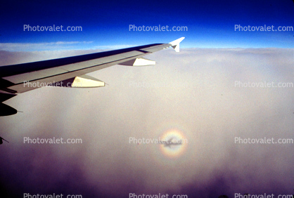 360 degree Rainbow over California, wing fence, Trailing Edge Right Wing over Southern California, Airbus A320 series, Shadow, Glory Ring Halo, Cloudbow, daytime, daylight, Lone Wing in Flight