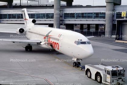 N727FV, Boeing 727-221RE, San Francisco International Airport (SFO), pusher tug, tractor, towbar, JT8D, 727-200 series