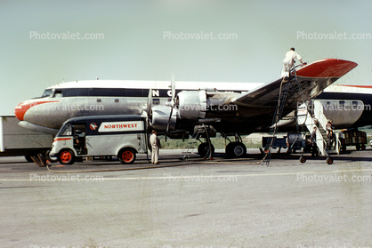 N34598, Douglas DC-6A, Northwest Airlines NWA, Service Van, Refueling, Ground Equipment, 1950s