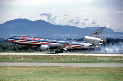 N1765B, Landing with Smoke Billowing from the Tires, American Airlines AAL, McDonnell Douglas, MD-11, CF6-80C2D1F, CF6