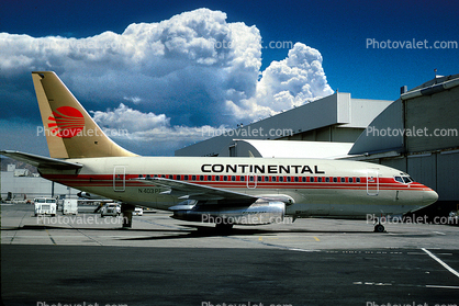N403PE, Continental Airlines COA, Boeing 737-130, 737-100 series, Cumulus Clouds, milestone of flight