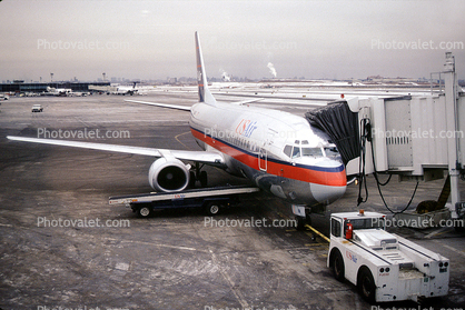 Boeing 737, La Guardia International Airport, US Airways AWE, pusher tug, tow tractor, jetway, January 1994