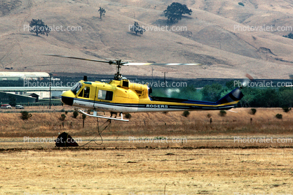 N45731, Bell HU-1B-BF Iroquois, Water bucket, firefighting in California, flying, flight, airborne, hover, hovering
