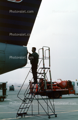 Repairing a tail light, Embraer Brasilia EMB-120