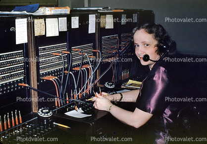 Telephone Operator, Woman, headset, switchboard, patch bay, 1940s
