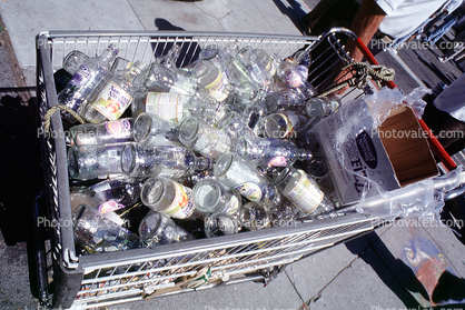 shopping cart full of bottles, glass