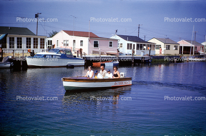 Houses, Homes, shoreline, docks, powerboats, 1950s