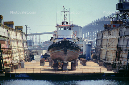 Tugboat head-on in Floating Drydock, front view