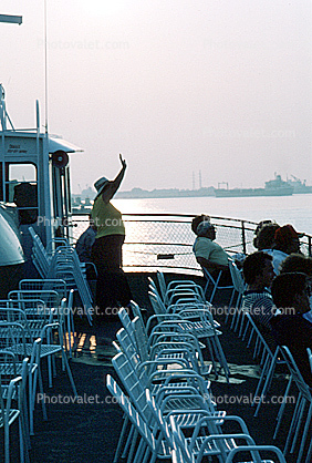 Sightseers on a boat deck, Mississippi River, New Orleans