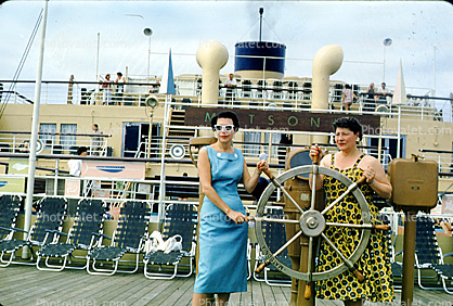 Matsonia, Women working a mock steering wheel, Cruise Ship, 1963, IMO: 5229223, 1960s