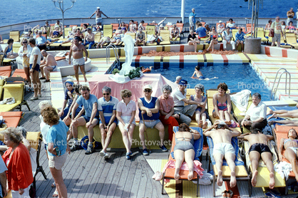 Swimming Pool, lounge chair, sunning, sun worshippers, crowded
