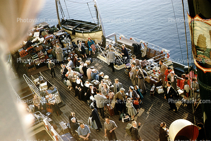 rear deck, nuns, lifeboat, Passengers, 1950s
