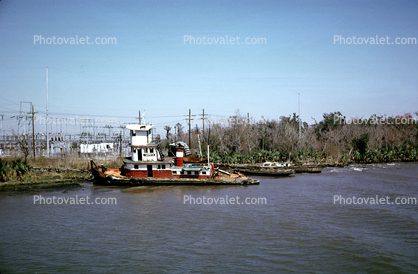 abandoned tugboat, river, shoreline
