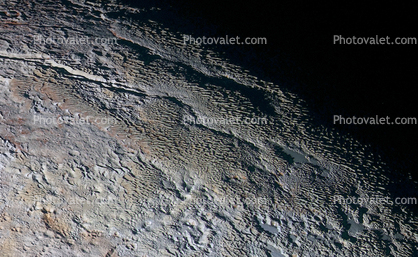 The Tartarus Dorsa Mountains Rise Up Along Pluto, snakeskin texture