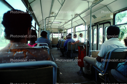 inside a bus, seats, passengers, people