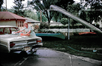 Woman Washing a Buick Car, Vehicle, Automobile, 1960s