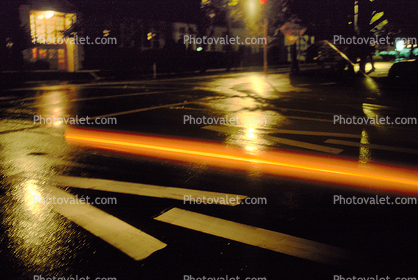 Arrow, Direction, Night, Exterior, Outdoors, Outside, Street, Road, Roadway, Pavement, Nighttime